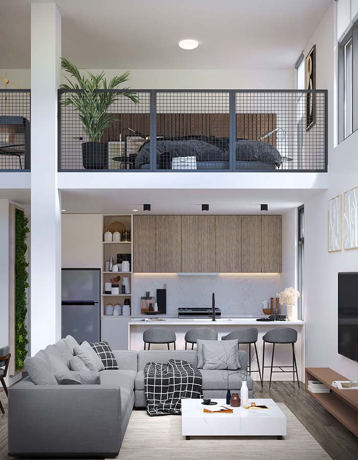 A rendering of a modern two level townhouse, showing a living room and kitchen that is open to the second floor.