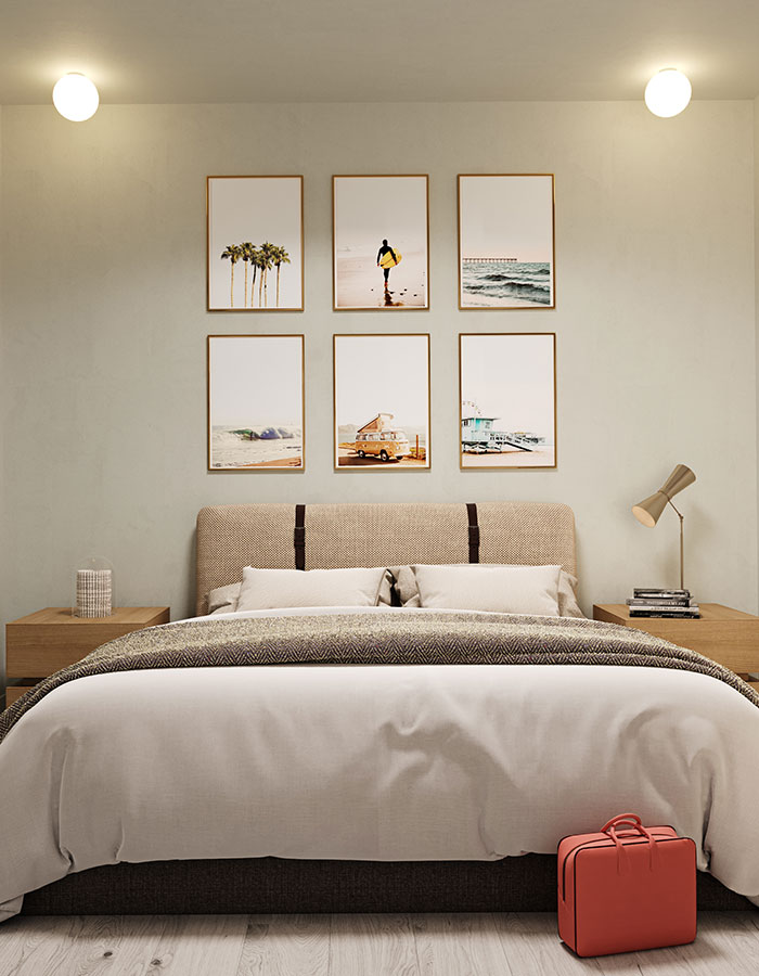 A rendering of a bedroom with neutral tones and size pieces of artwork above the headboard.