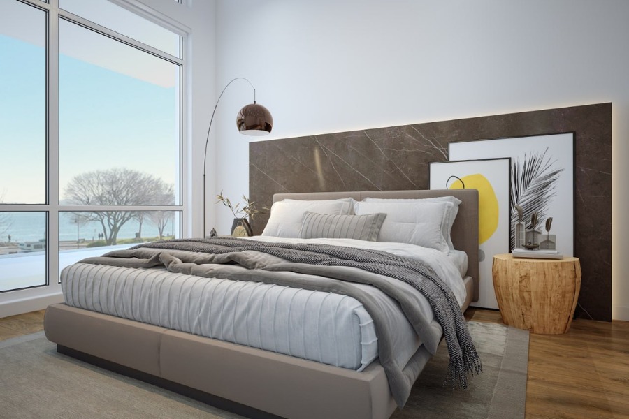 The Rise on Fifth's rendering of a bedroom with a view of the ocean.