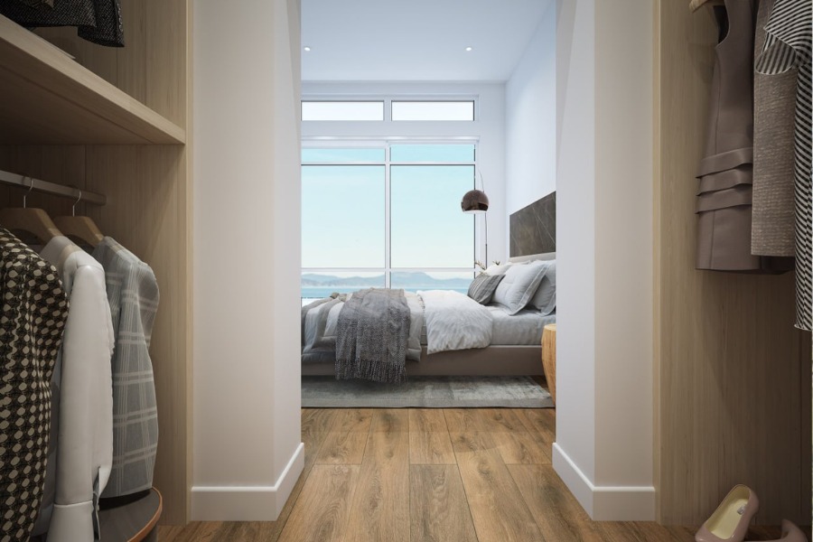 The Rise on Fifth's rendering of a bedroom and walk-in closet, with a view of the ocean.